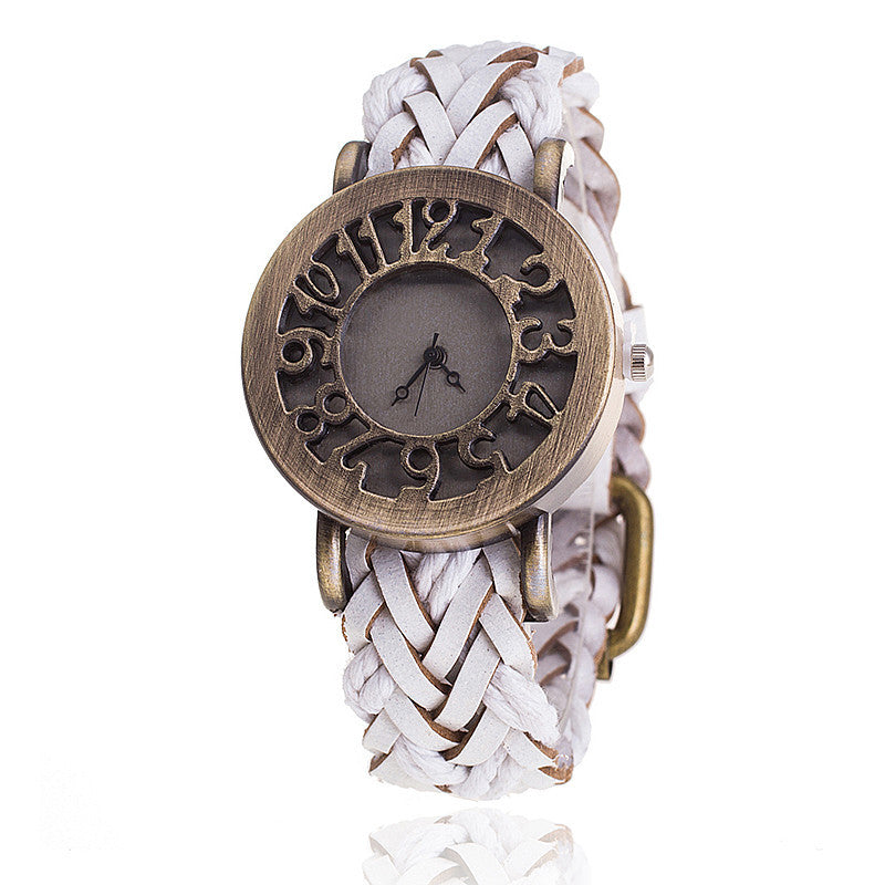 Reloj hueco retro de cuero tejido con cabeza de reloj de pulsera para mujer