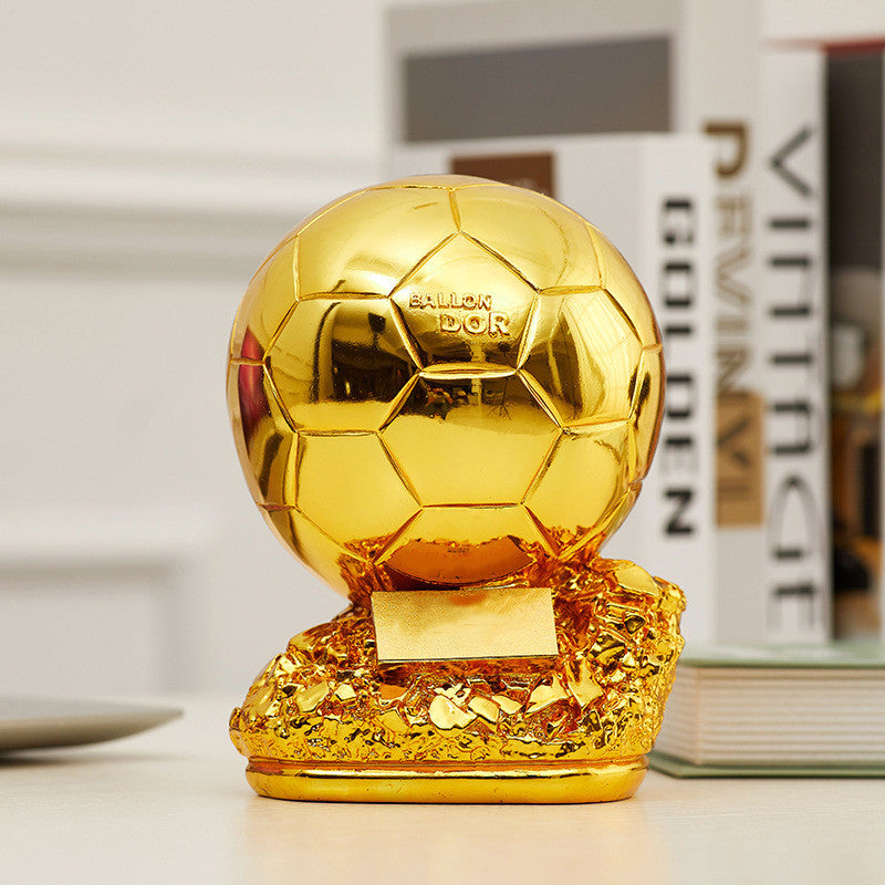 mini gold ball trophy for the winner