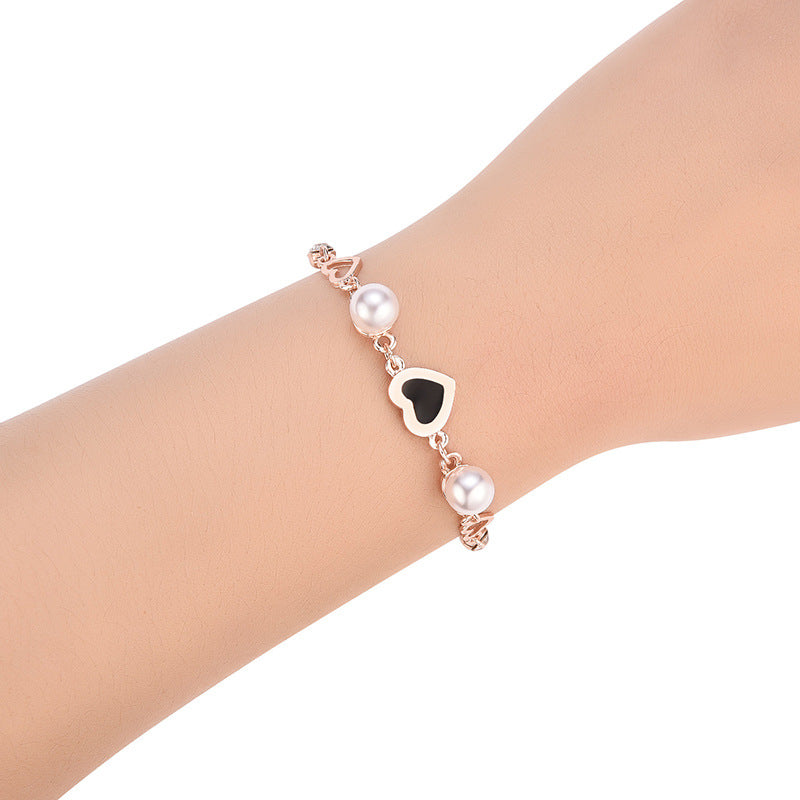 Bracelet en alliage en forme d'amour romantique avec perles