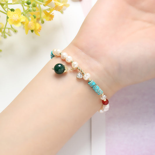 Pulsera turquesa de ágata a juego con el color de la perla natural de agua dulce