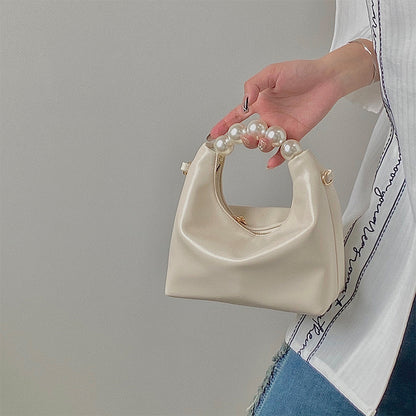 Bolso bandolera con diseño de perla Niche Design