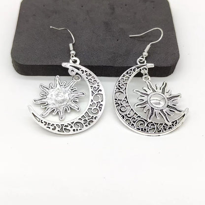 Pendientes de sol de luna ahuecados de moda