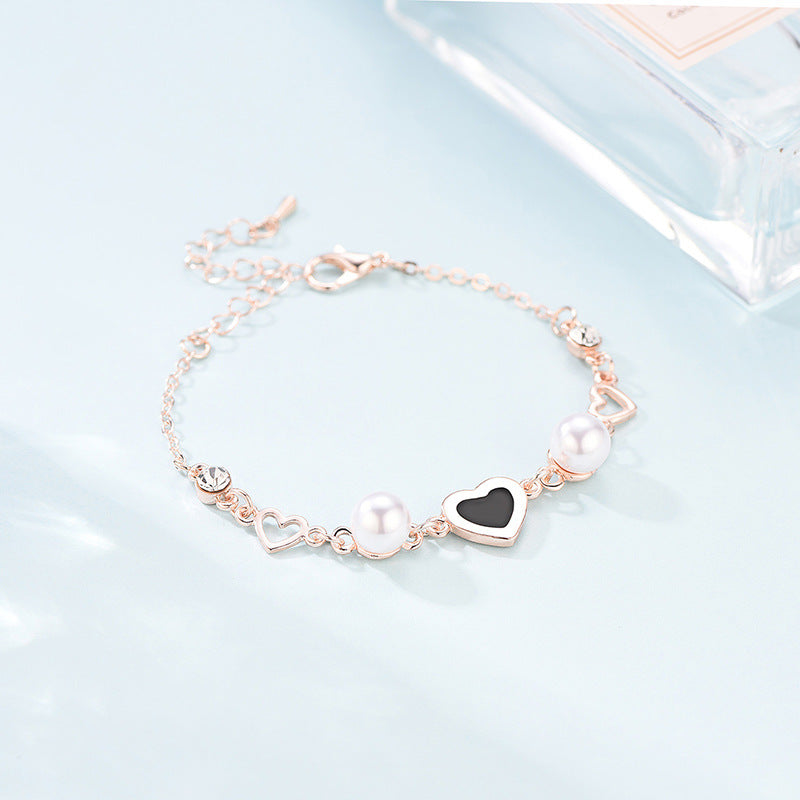 Bracelet en alliage en forme d'amour romantique avec perles